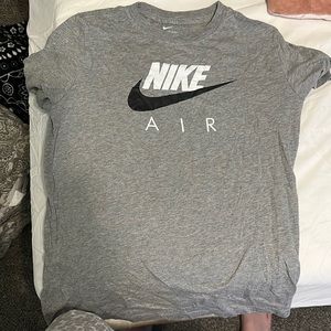 nike shirt , runs like a medium in women